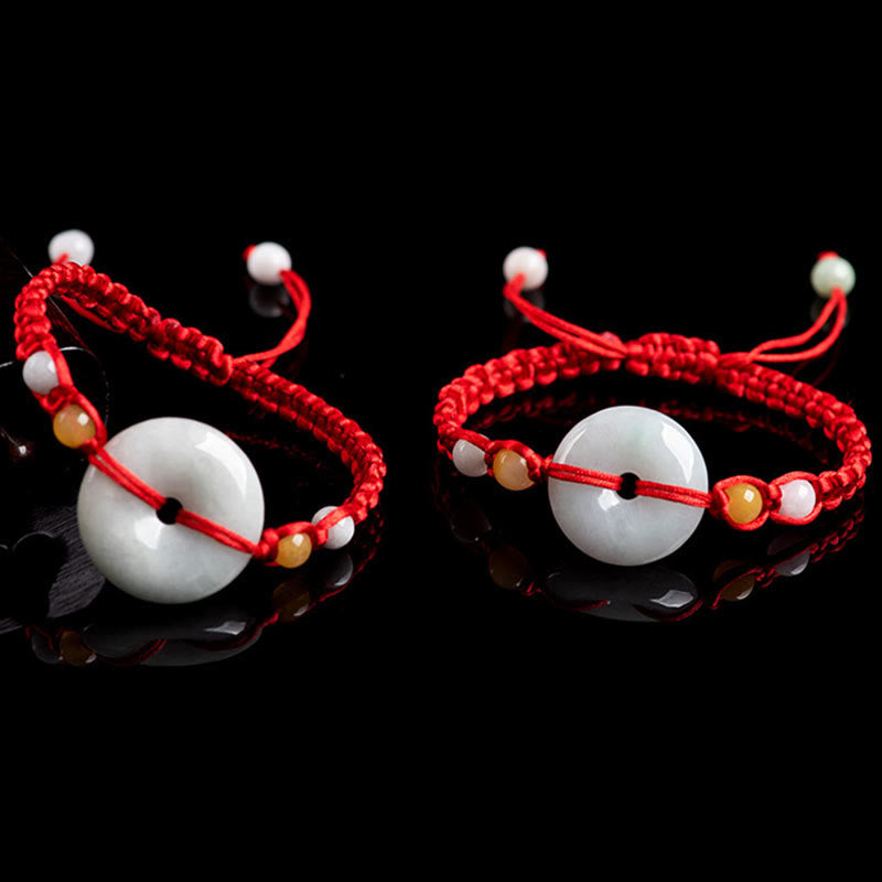 Bracelet en fil rouge avec boucle de paix en jade et Buddha Stones