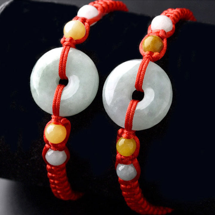 Bracelet en fil rouge avec boucle de paix en jade et Buddha Stones