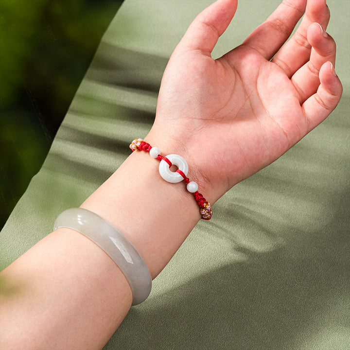 Bracelet en fil rouge Buddha Stones Jade Luck Abundance