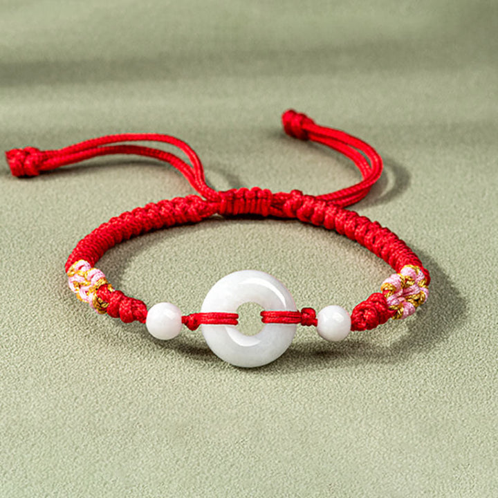 Bracelet en fil rouge Buddha Stones Jade Luck Abundance