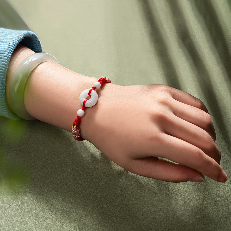 Bracelet en fil rouge Buddha Stones Jade Luck Abundance