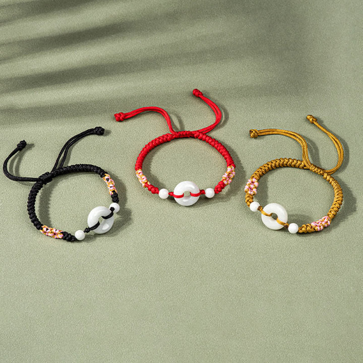 Bracelet en fil rouge Buddha Stones Jade Luck Abundance