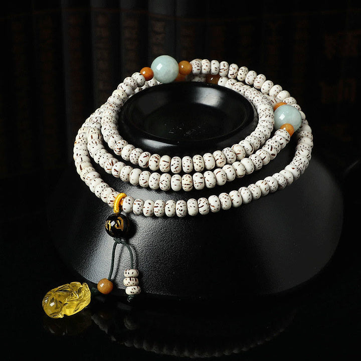 Bracelet tibétain en agate et ambre avec graines de Bodhi et Buddha Stones