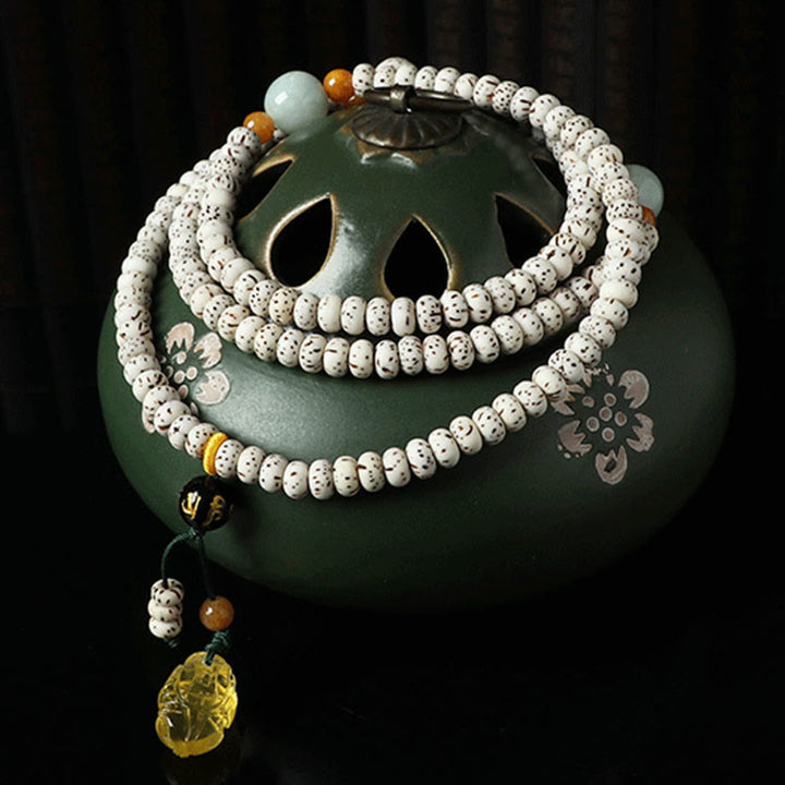 Bracelet tibétain en agate et ambre avec graines de Bodhi et Buddha Stones