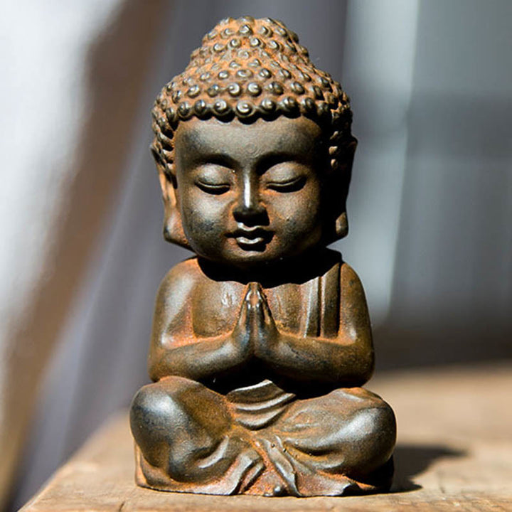 Statue de Buddha Stones Sakyamuni en résine moulée à la main en poudre de fer et rouille