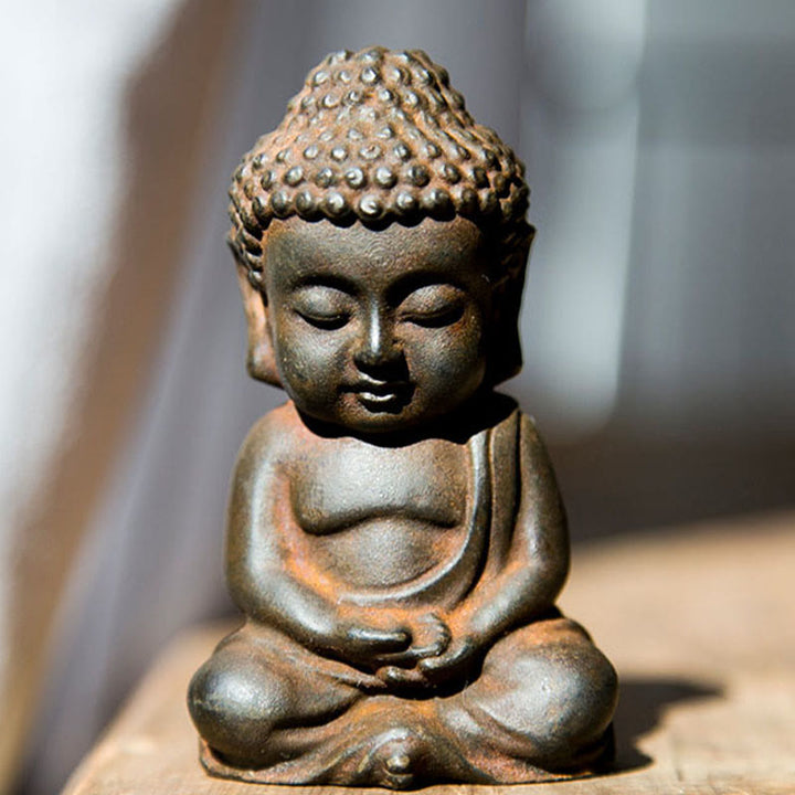 Statue de Buddha Stones Sakyamuni en résine moulée à la main en poudre de fer et rouille