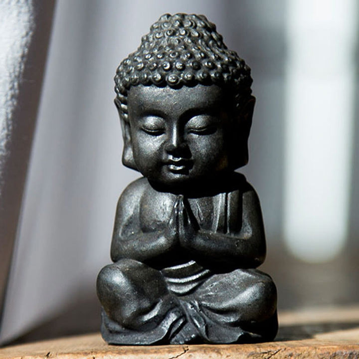 Statue de Buddha Stones Sakyamuni en résine moulée à la main en poudre de fer et rouille