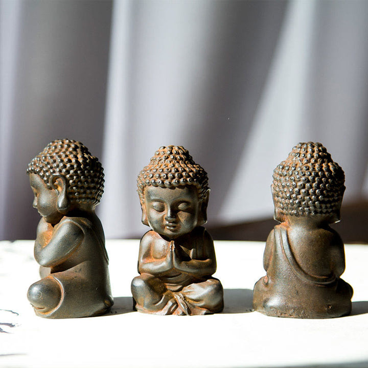 Statue de Buddha Stones Sakyamuni en résine moulée à la main en poudre de fer et rouille