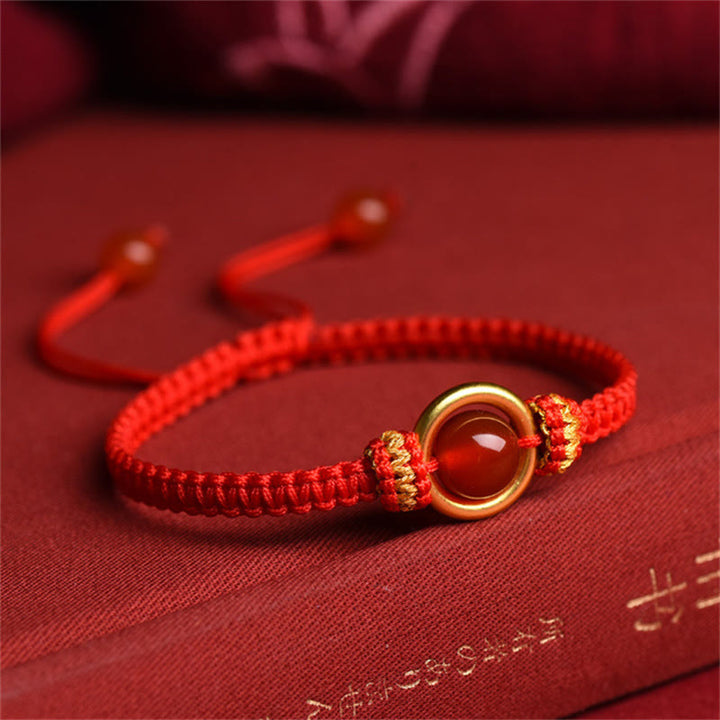 Bracelet en corde calme avec boucle de paix et perles d'agate rouge en Buddha Stones