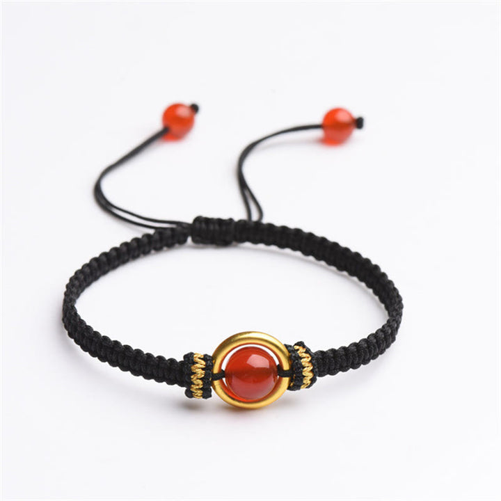 Bracelet en corde calme avec boucle de paix et perles d'agate rouge en Buddha Stones