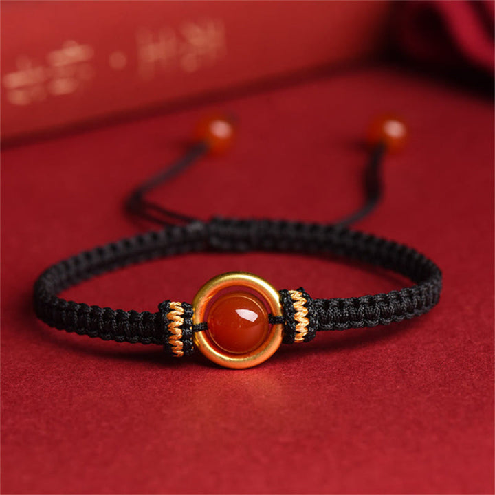 Bracelet en corde calme avec boucle de paix et perles d'agate rouge en Buddha Stones