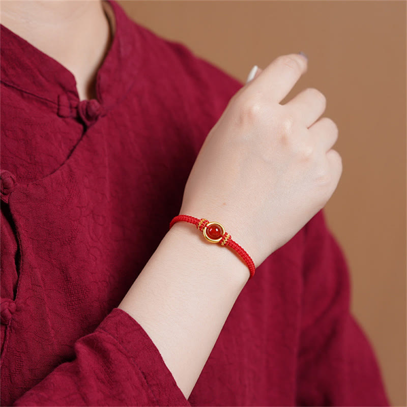 Bracelet en corde calme avec boucle de paix et perles d'agate rouge en Buddha Stones