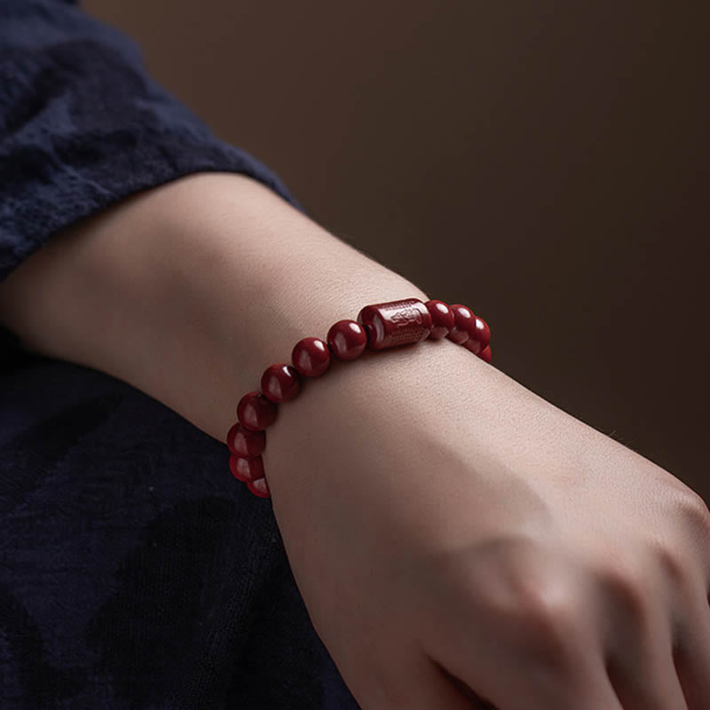 Bracelet de bénédiction du Sutra du cœur en cinabre naturel de Buddha Stones