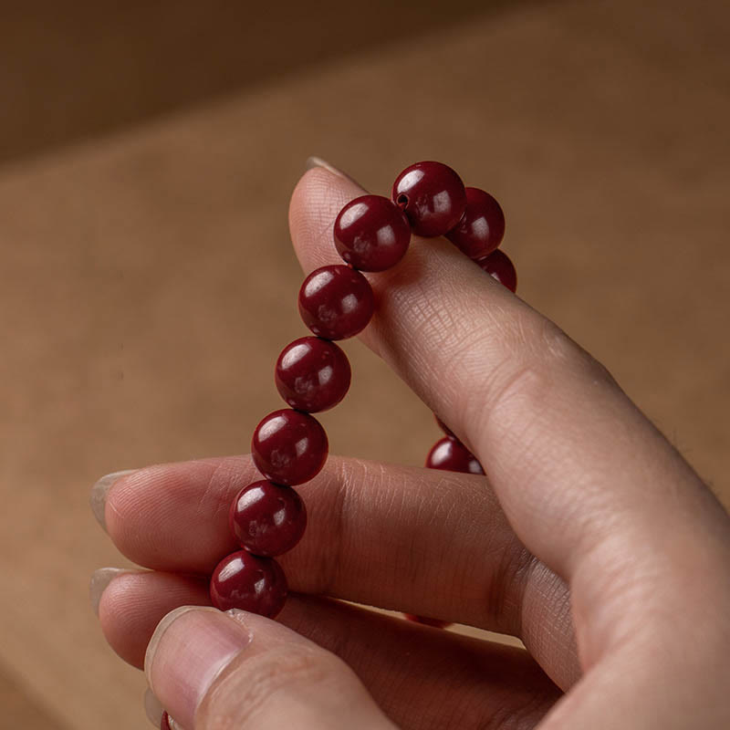 Bracelet de bénédiction du Sutra du cœur en cinabre naturel de Buddha Stones