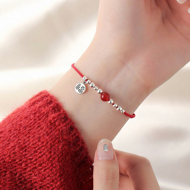 Bracelet en corde tressée ultra-mince en agate rouge avec personnage Fu en argent sterling 925 fait à la main par Buddha Stones