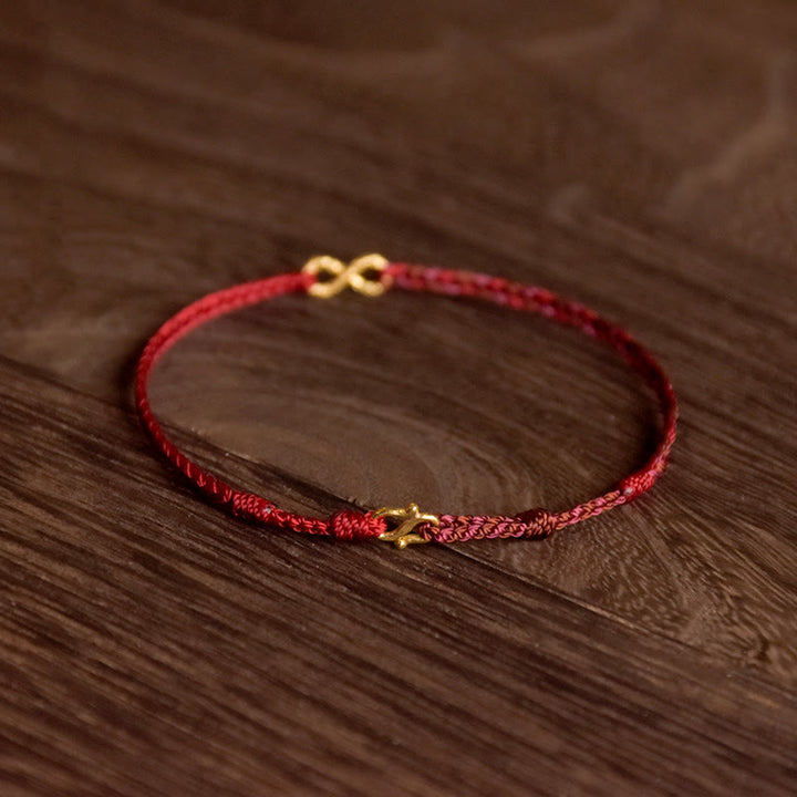 Bracelet porte-bonheur fait main en corde avec nœud sans fin en or 999 de Buddha Stones