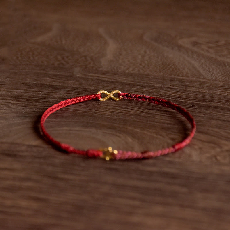 Bracelet porte-bonheur fait main en corde avec nœud sans fin en or 999 de Buddha Stones