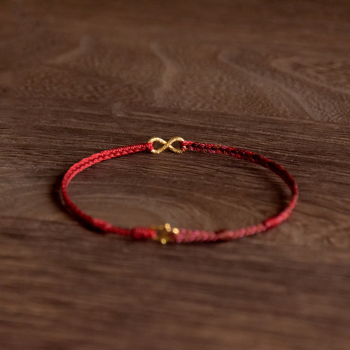 Bracelet porte-bonheur fait main en corde avec nœud sans fin en or 999 de Buddha Stones