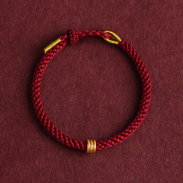 Bracelet en corde tressée fait main avec triple anneau en or 999 de Buddha Stones - image 1