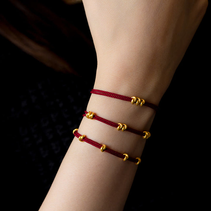 Bracelet en corde tressée fait main avec motif de nœud de souhait en or 999 de Buddha Stones
