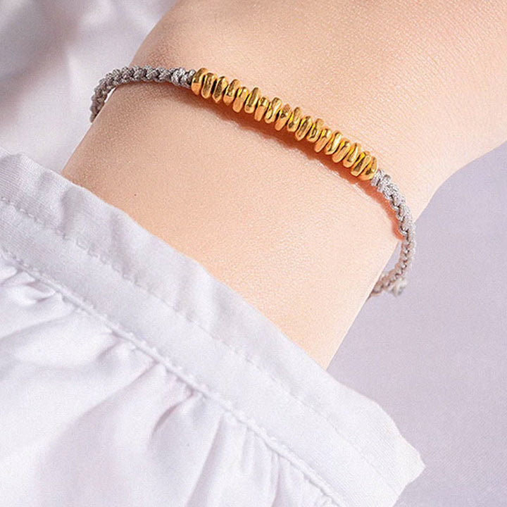 Bracelet en corde tressée de protection fait main en petites pièces d'or 999 Buddha Stones