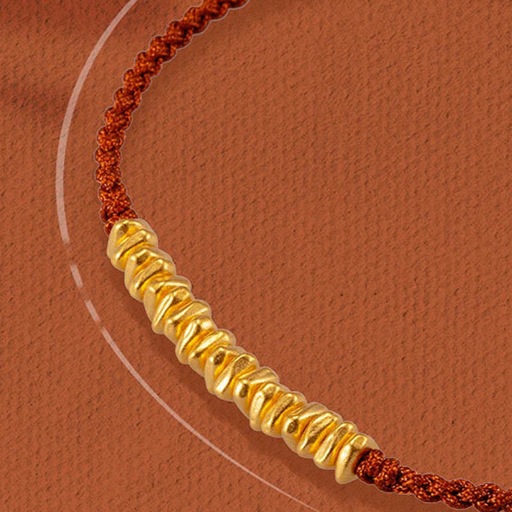 Bracelet en corde tressée de protection fait main en petites pièces d'or 999 Buddha Stones