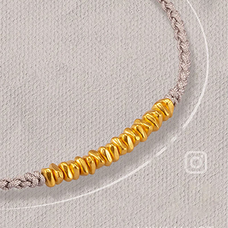 Bracelet en corde tressée de protection fait main en petites pièces d'or 999 Buddha Stones
