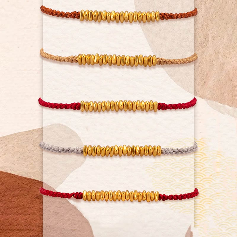 Bracelet en corde tressée de protection fait main en petites pièces d'or 999 Buddha Stones