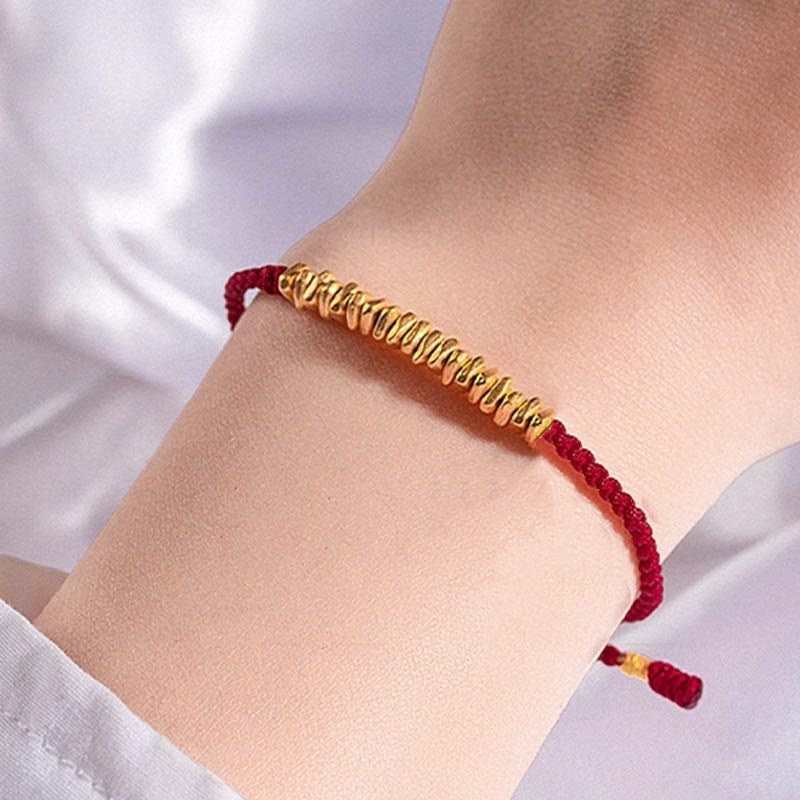 Bracelet en corde tressée de protection fait main en petites pièces d'or 999 Buddha Stones