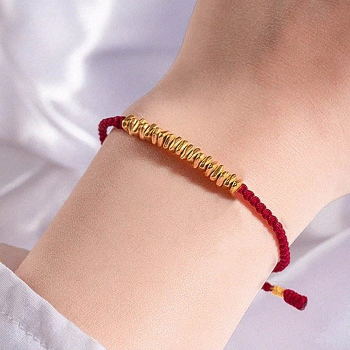 Bracelet en corde tressée de protection fait main en petites pièces d'or 999 Buddha Stones