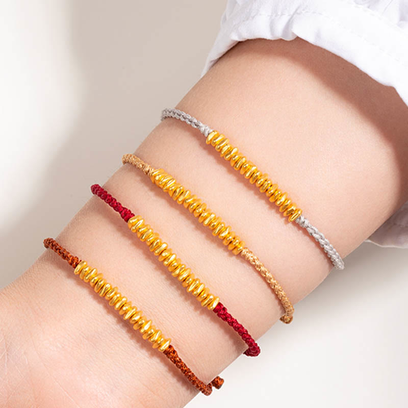 Bracelet en corde tressée de protection fait main en petites pièces d'or 999 Buddha Stones