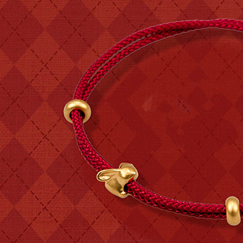 Bracelet en corde tressée fait main avec petit lapin porte-bonheur en or 999 de Buddha Stones