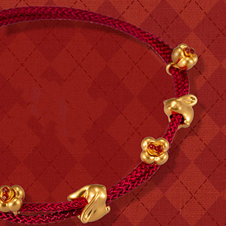 Bracelet en corde tressée fait main avec petit lapin porte-bonheur en or 999 de Buddha Stones