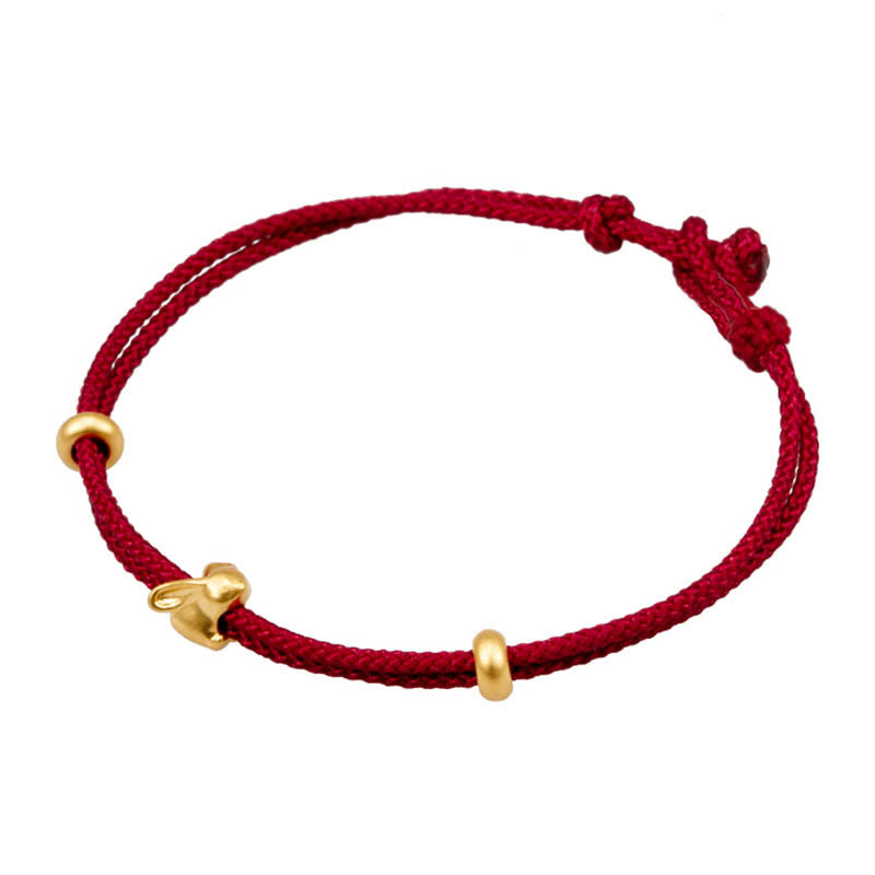 Bracelet en corde tressée fait main avec petit lapin porte-bonheur en or 999 de Buddha Stones