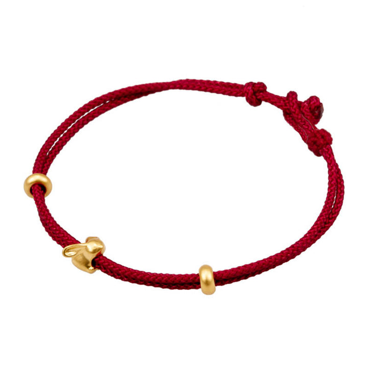 Bracelet en corde tressée fait main avec petit lapin porte-bonheur en or 999 de Buddha Stones