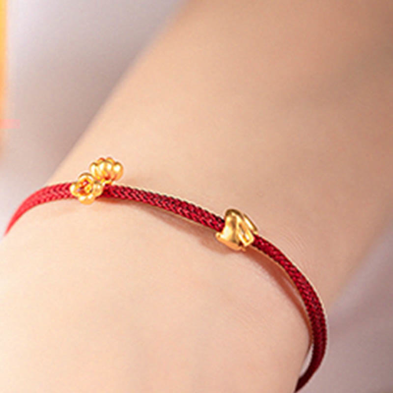 Bracelet en corde tressée fait main avec petit lapin porte-bonheur en or 999 de Buddha Stones