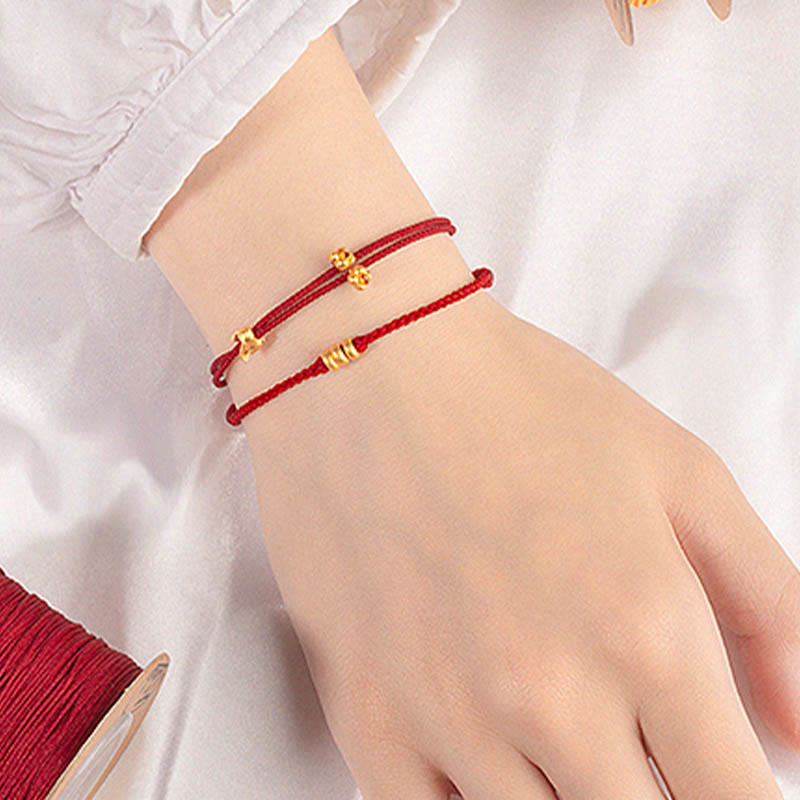 Bracelet en corde tressée fait main avec petit lapin porte-bonheur en or 999 de Buddha Stones