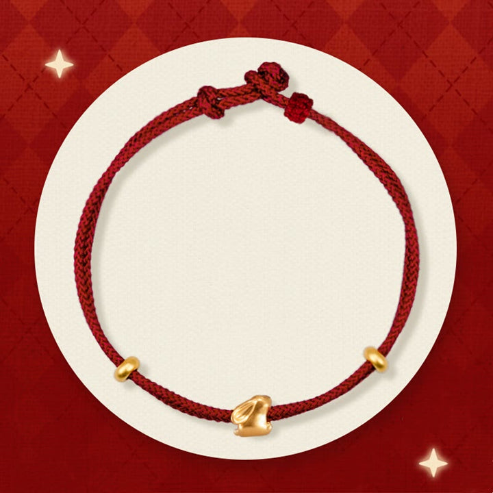 Bracelet en corde tressée fait main avec petit lapin porte-bonheur en or 999 de Buddha Stones - Lapin porte-bonheur et deux perles d'or (environ 0,31 g d'or) - 21 cm - image 0