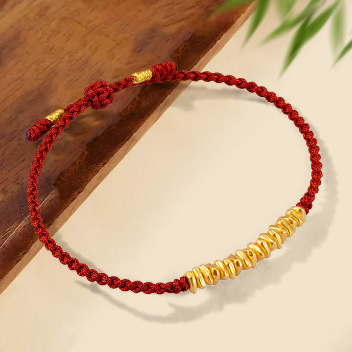 Bracelet en corde tressée de protection fait main en petites pièces d'or 999 Buddha Stones