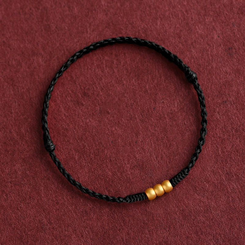 Bracelet de cheville en corde porte-bonheur fait main avec mini trois perles en or 999 de Buddha Stones