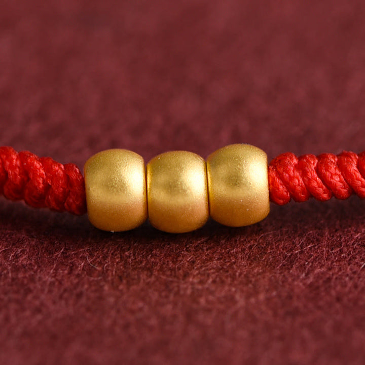 Bracelet de cheville en corde porte-bonheur fait main avec mini trois perles en or 999 de Buddha Stones