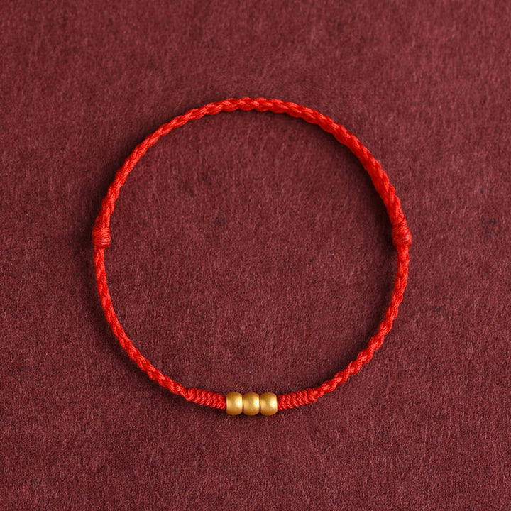 Bracelet de cheville en corde porte-bonheur fait main avec mini trois perles en or 999 de Buddha Stones - Bracelet de cheville (circonférence 18-30 cm) - Rouge - image 0