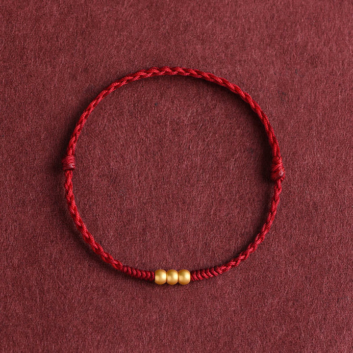 Bracelet de cheville en corde porte-bonheur fait main avec mini trois perles en or 999 de Buddha Stones - Bracelet de cheville (circonférence 18-30 cm) - Rouge foncé - image 7
