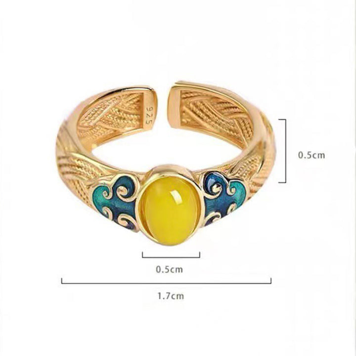 Bague réglable en cuivre ambré Buddha Stones et nuages propices