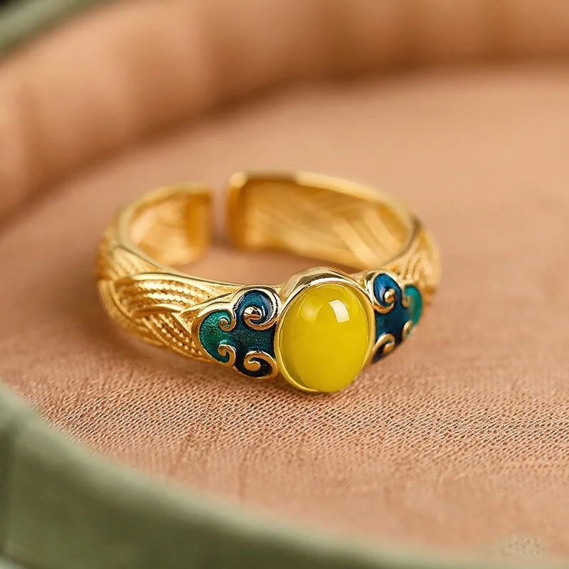 Bague réglable en cuivre ambré Buddha Stones et nuages propices