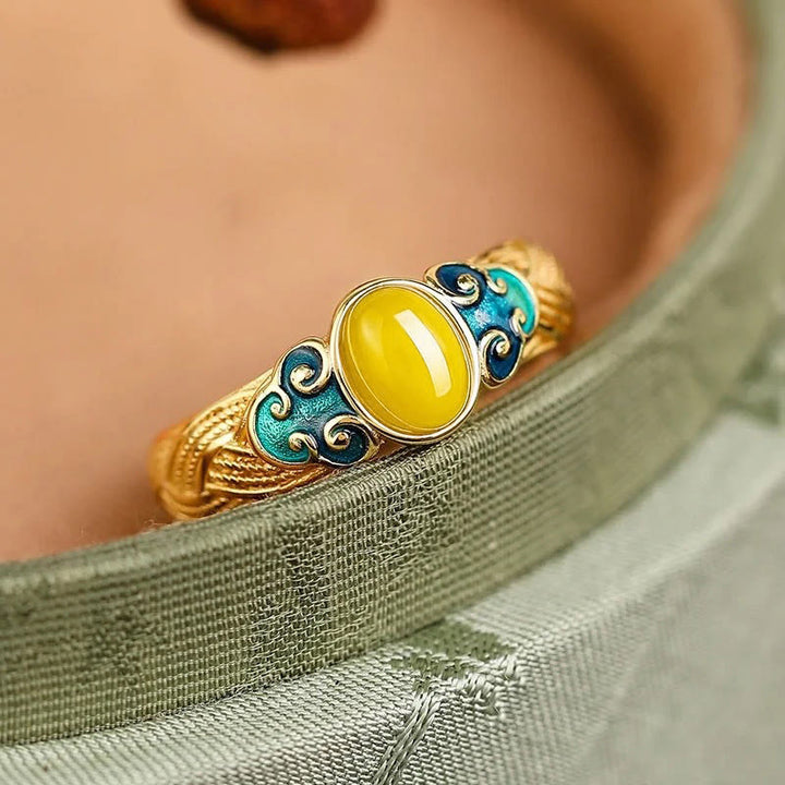 Bague réglable en cuivre ambré Buddha Stones et nuages propices