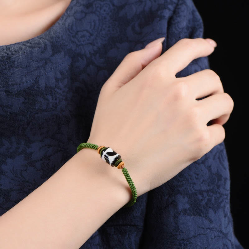 Bracelet de protection en corde verte tressée en perles dzi tibétaines faites à la main avec Buddha Stones
