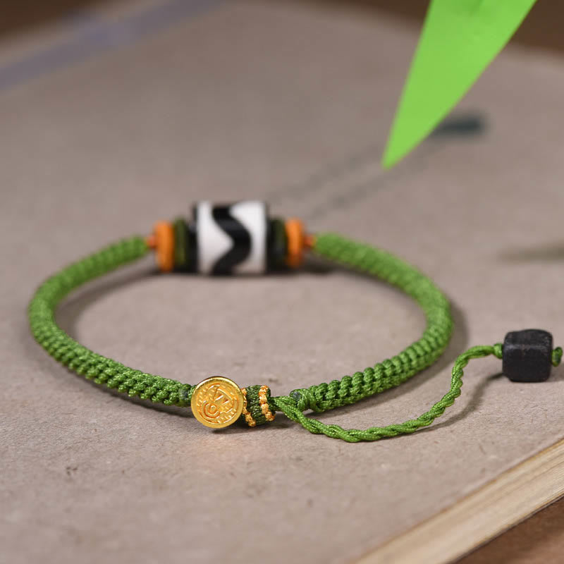 Bracelet de protection en corde verte tressée en perles dzi tibétaines faites à la main avec Buddha Stones
