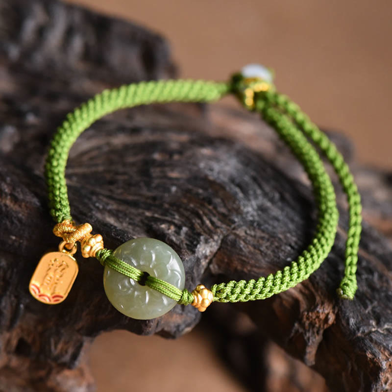 Bracelet en corde verte avec boucle de paix en jade vert et Buddha Stones