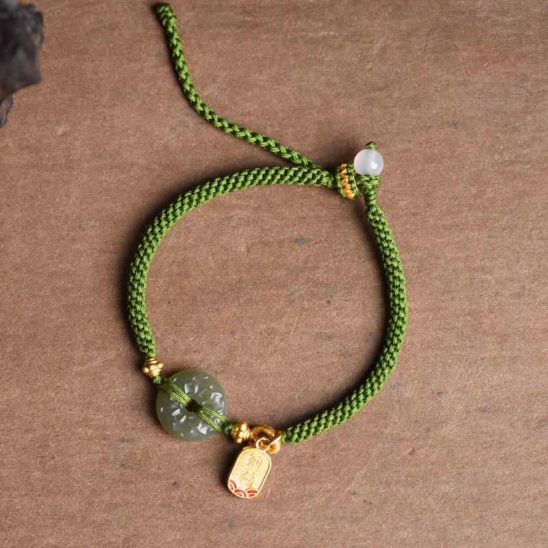 Bracelet en corde verte avec boucle de paix en jade vert et Buddha Stones